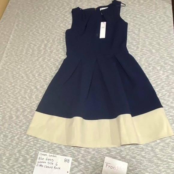 Closet London Dresses & Skirts - Navy blue Closet London dress with cream trim women Size 6 New with tag. SKU818